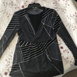 Daisy Fuentes black geometric striped top.